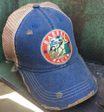 blue cap with a barrel racer patch on it